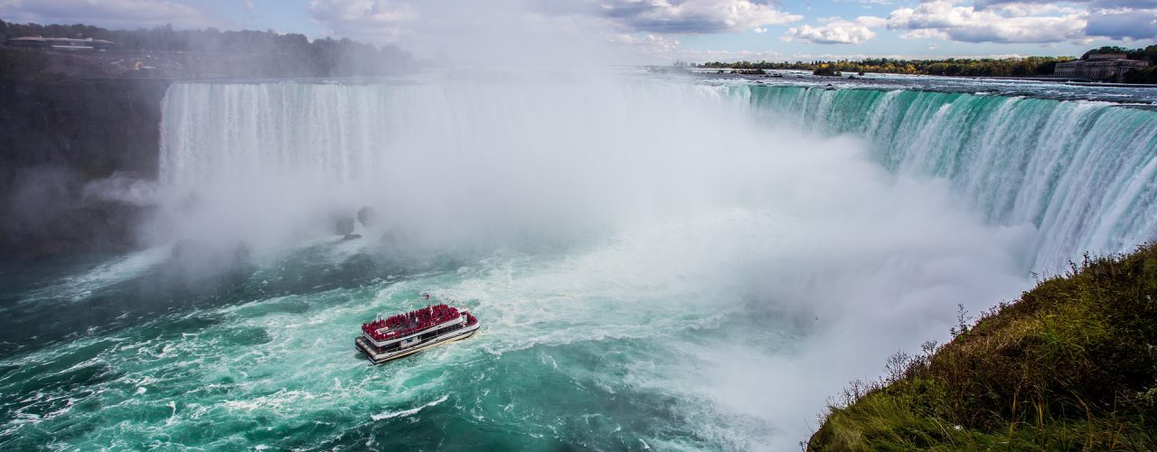 family vacation on boat at Niagara Falls